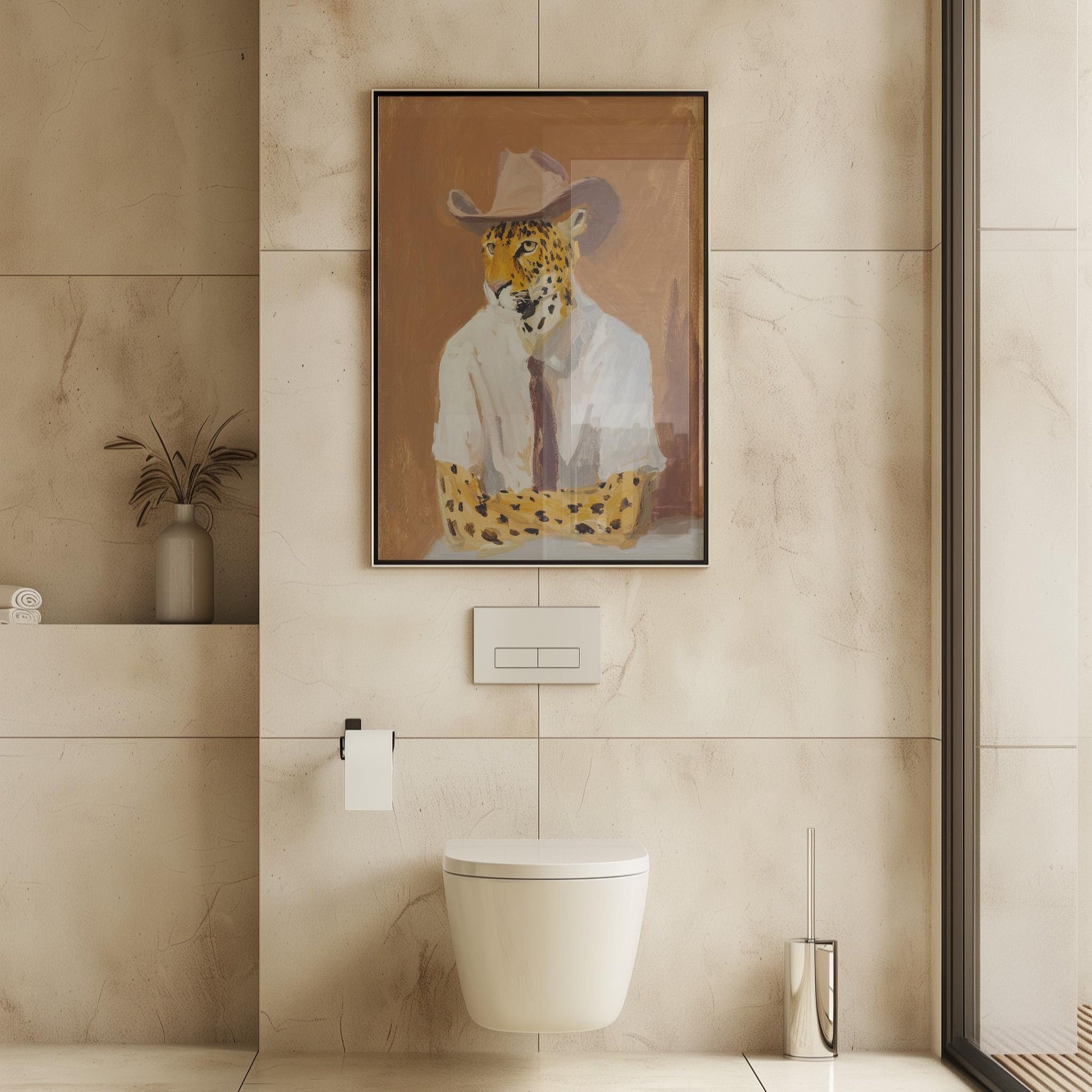 a bathroom with a framed picture of a leopard wearing a cowboy hat, mounted on the wall above a white toilet.