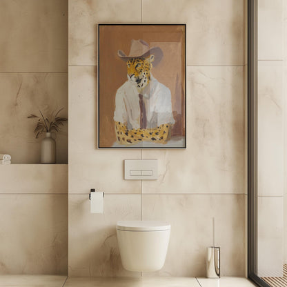 a bathroom with a framed picture of a leopard wearing a cowboy hat, mounted on the wall above a white toilet.