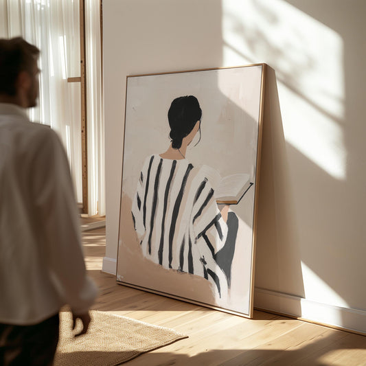 Figurative Canvas Wall Art Woman Reading Book in Black and White Striped Dress Neutral Background