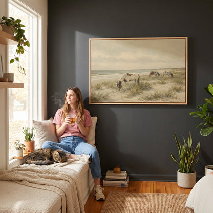 Wild ponies canvas wall art showing wild ponies grazing on a dune beach beside pale ocean surf