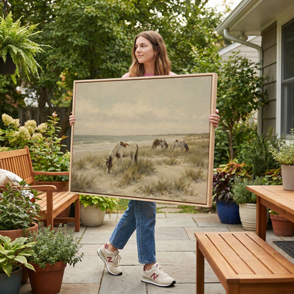 Wild ponies grazing on a dune beach beside pale ocean surf, canvas print