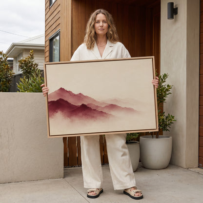 Landscape canvas wall art showing layered burgundy mountain ridges fading into pale mist