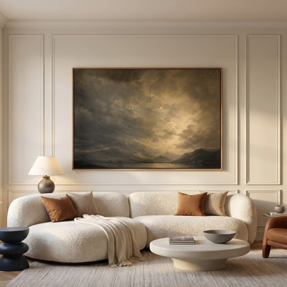 Cloud canvas wall art showing broken storm cloud lit from behind over a still lake with low fells and tiny white cottages