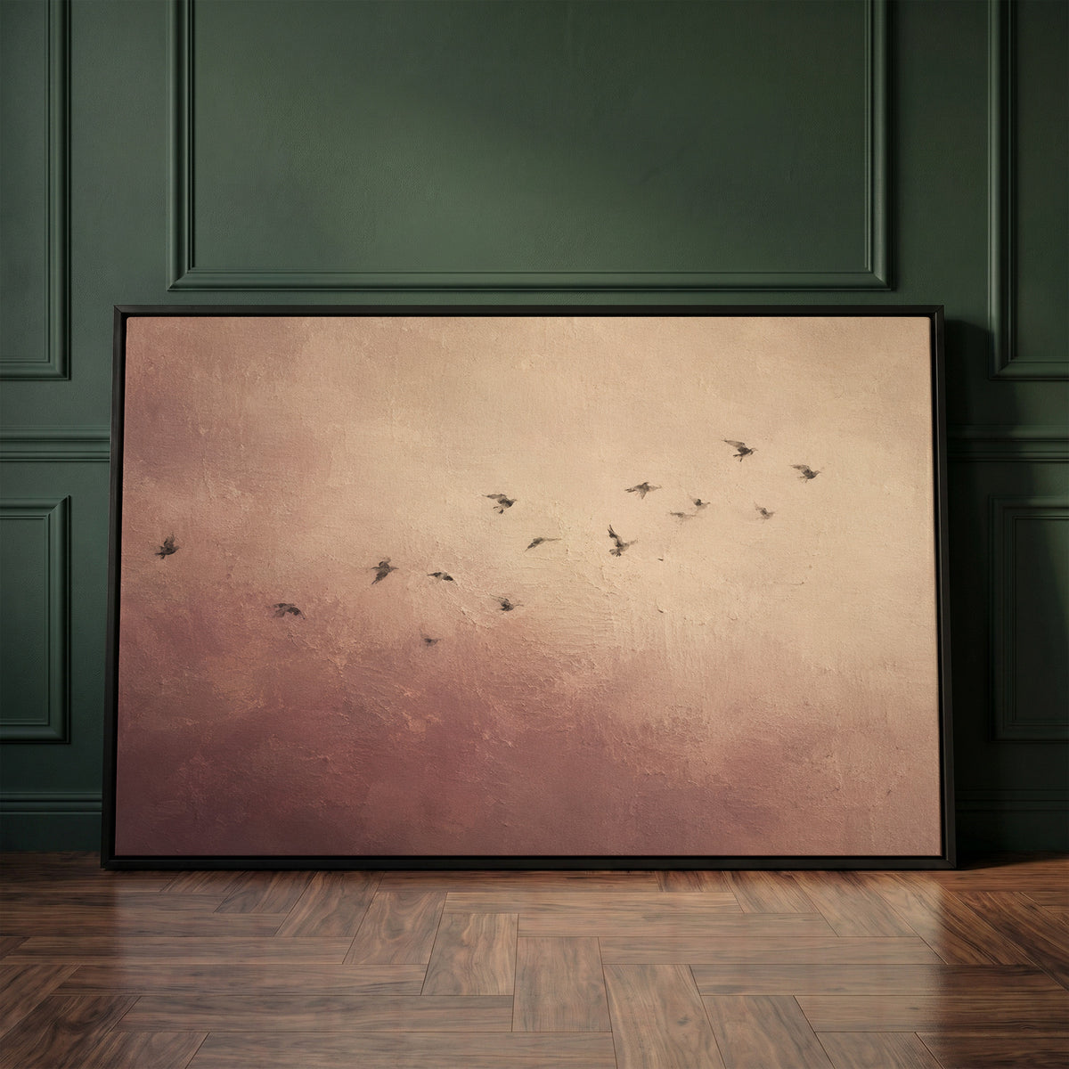 Calm canvas wall art showing a scattered flock of small dark birds flying across a dusty rose and cream ground
