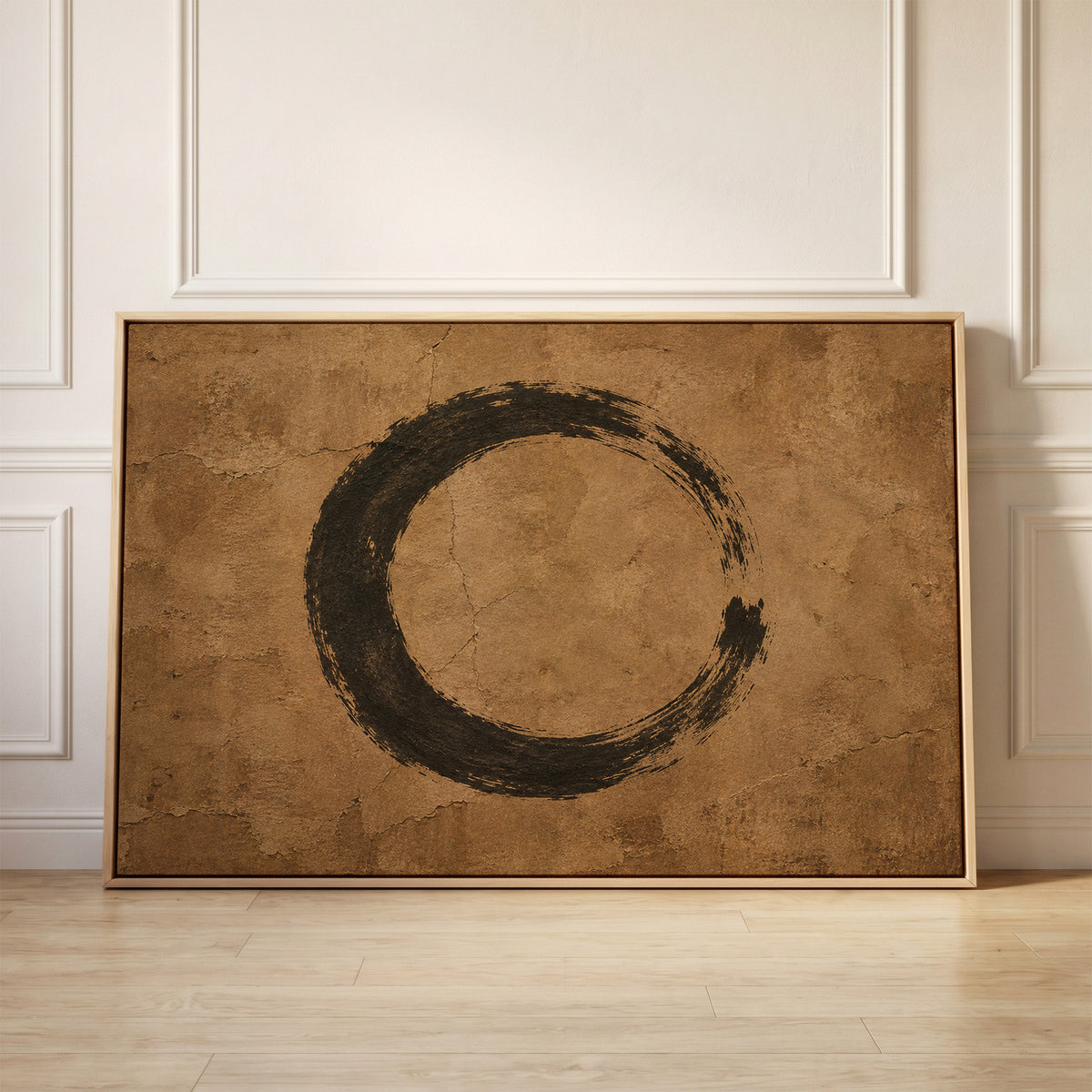 A black enso circle brushed on a cracked warm brown ground, open on the right side, canvas wall art