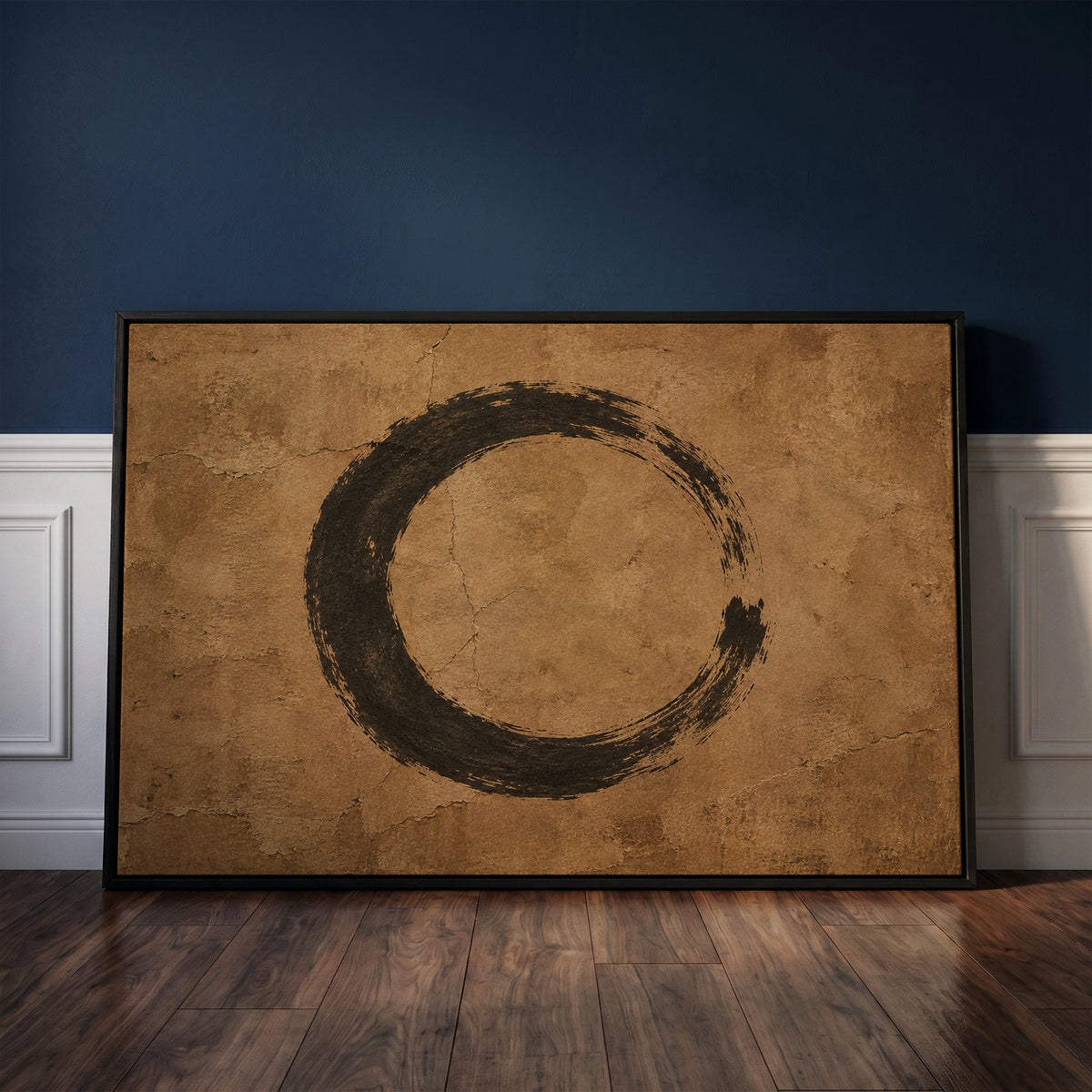 Meditation canvas wall art showing a black enso circle brushed on a cracked warm brown ground, open on the right side