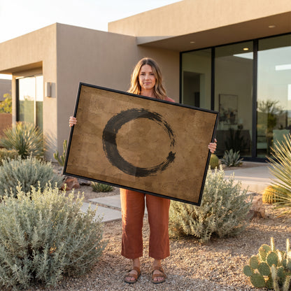 Ink painting canvas wall art showing a black enso circle brushed on a cracked warm brown ground, open on the right side