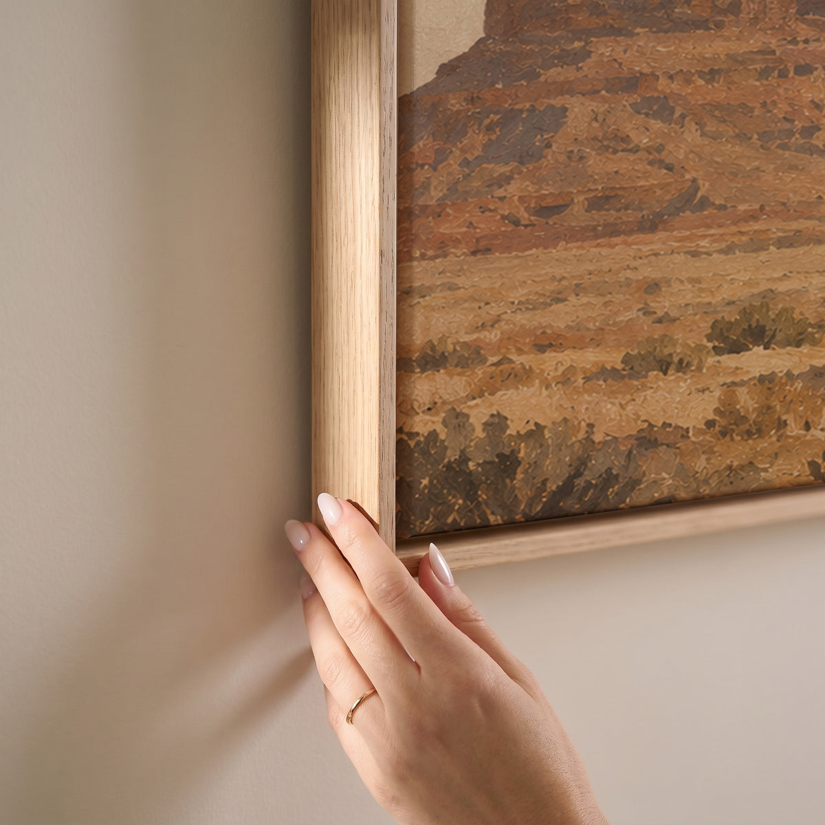 A lone rider on horseback crossing desert sagebrush below three sandstone buttes, horizontal canvas print
