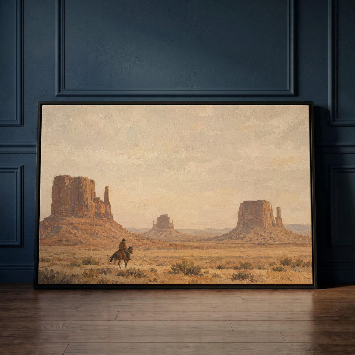 Desert canvas canvas wall art showing a lone rider on horseback crossing desert sagebrush below three sandstone buttes