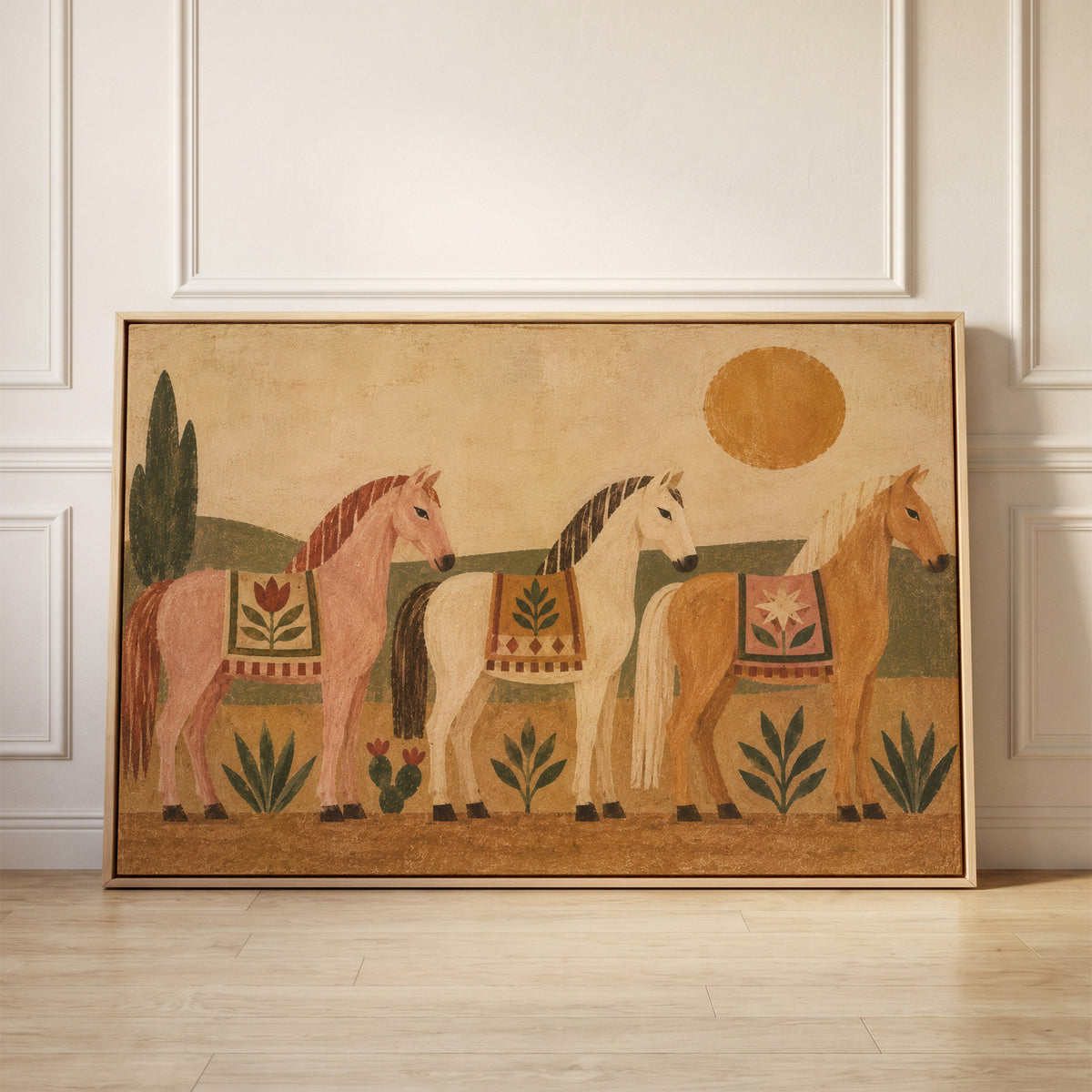 Three naive folk horses in patterned blankets standing in a row under a gold sun, canvas wall art