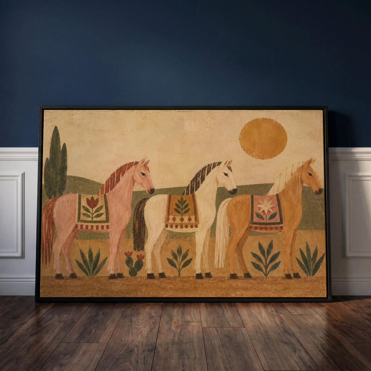 Naive canvas wall art showing three naive folk horses in patterned blankets standing in a row under a gold sun