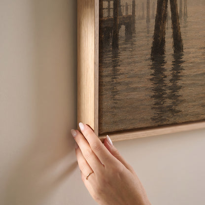 The domed basilica of Santa Maria della Salute in fog beyond leaning mooring poles in Venice, horizontal canvas print
