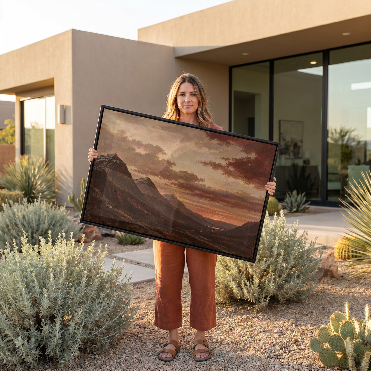 Sunset canvas wall art showing sunset over a deep Highland valley with layered dark ridges and a winding road