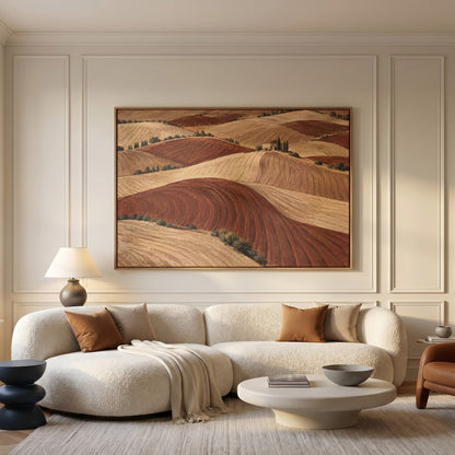Italian landscape canvas wall art showing rolling ploughed clay hills in red and cream with a small farmhouse on a distant ridge