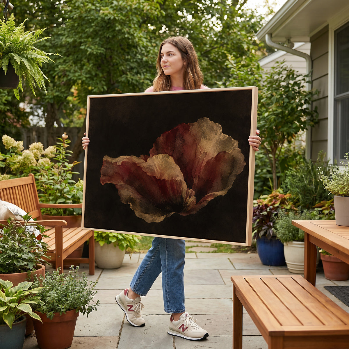Gothic canvas wall art showing single burgundy and gold poppy bloom floating on a near black background