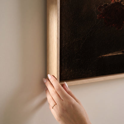 Dark still life of red and cream peonies in a vase backlit by a leaded window, horizontal canvas print