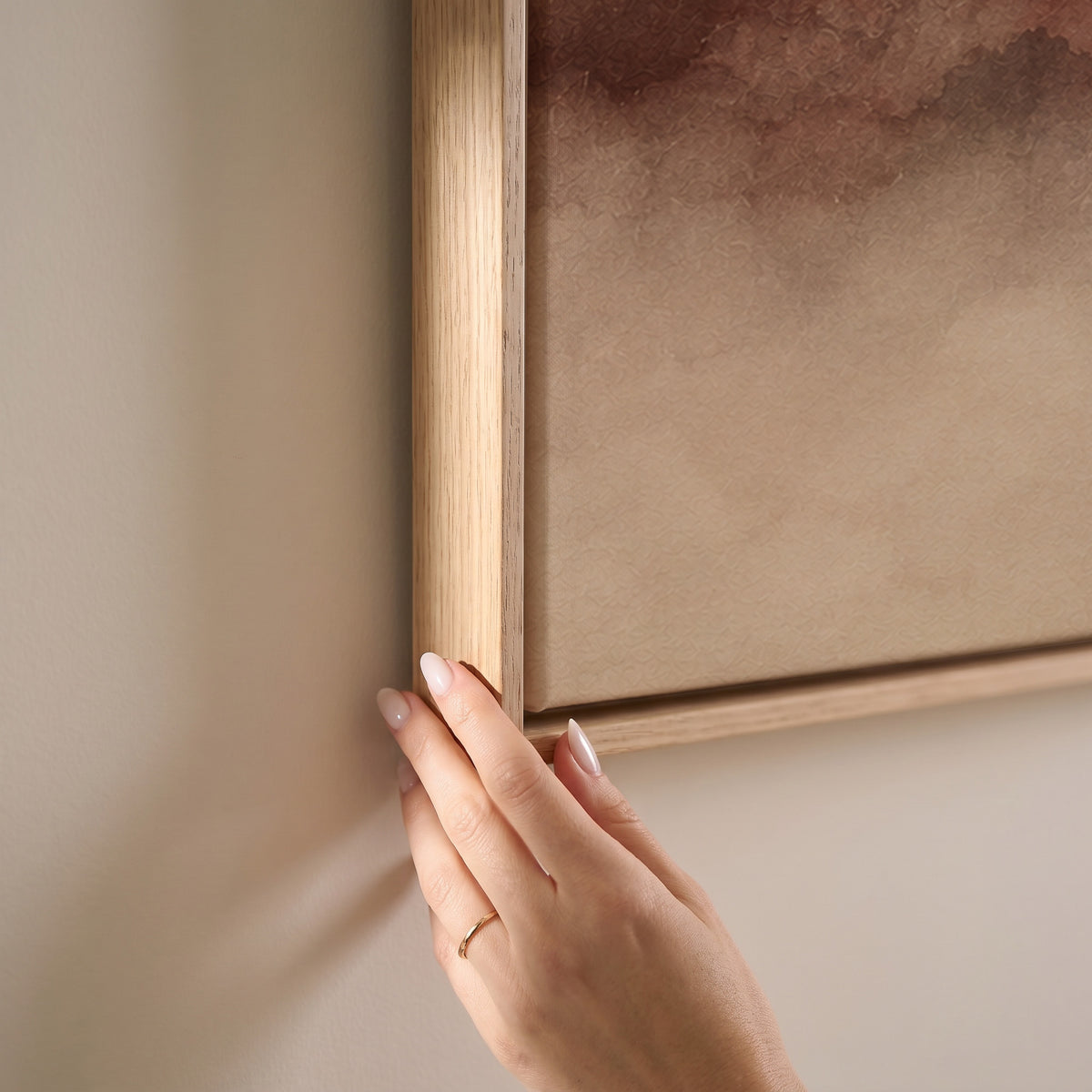 Layered mountain ridges in deep red fading into pale mist toward the horizon, horizontal canvas print