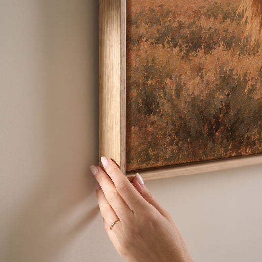 Grey and chestnut horse standing close together in golden light on open range, horizontal canvas print