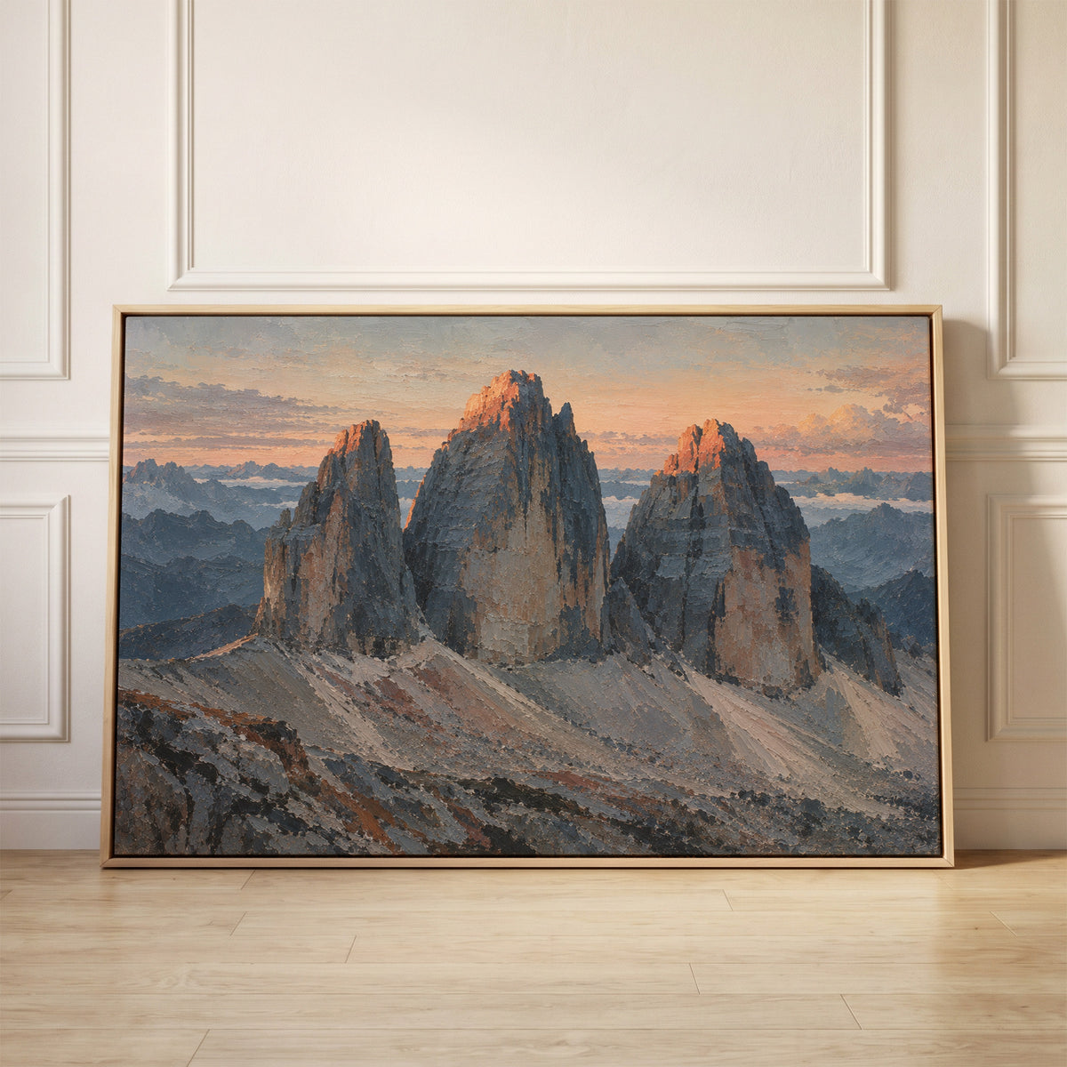 Three grey rock towers at dawn with warm light on the summits and scree below, canvas wall art