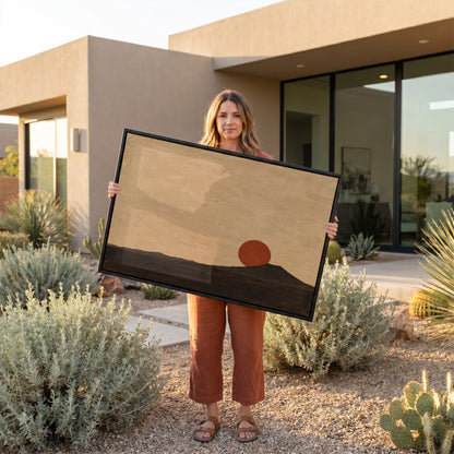 Red sun canvas wall art showing rust red sun disc resting on the shoulder of a dark volcanic cone at dusk