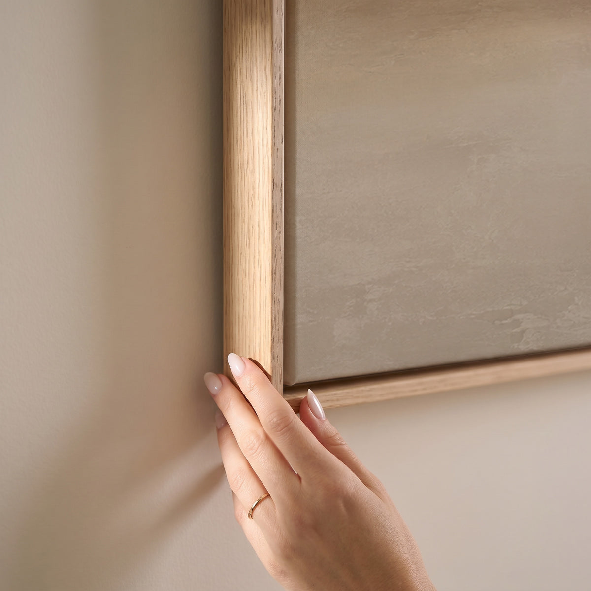 Soft beige abstract horizon with a warm sand band dissolving into pale grey, horizontal canvas print