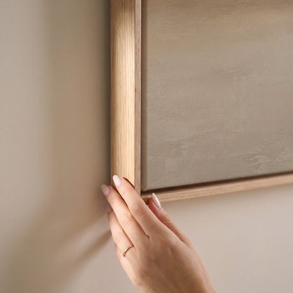 Soft beige abstract horizon with a warm sand band dissolving into pale grey, horizontal canvas print