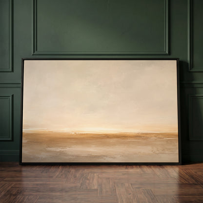 Neutral canvas wall art showing wide pale sky over a soft ochre shoreline with light breaking along the horizon
