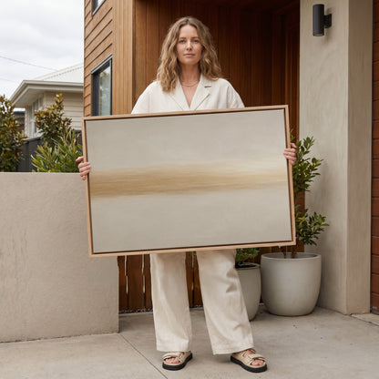 Modern minimal canvas wall art showing a single soft golden band drawn across a pale ivory ground