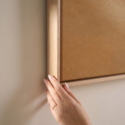 Smooth ochre and taupe dunes overlapping under a bone cream sky, horizontal canvas print
