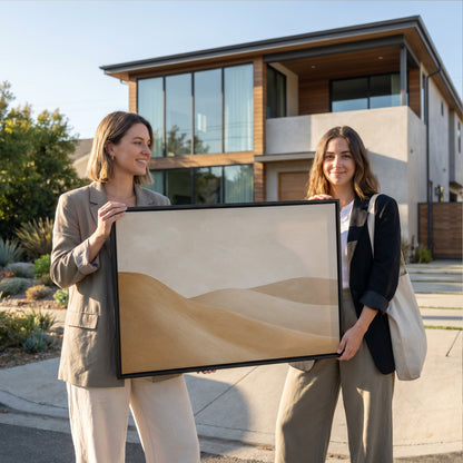 Warm neutral canvas wall art showing smooth ochre and taupe dunes overlapping under a bone cream sky
