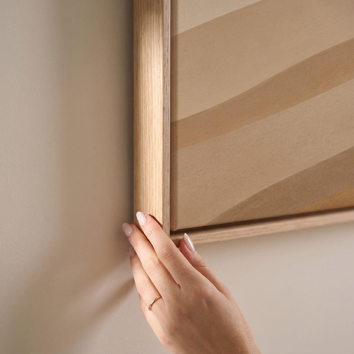 Pale desert ridges layered in tan, greige and ochre under a faint sky, horizontal canvas print