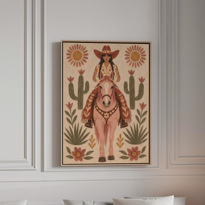 Folk art cowgirl on a pink horse framed by cacti and flowers, canvas wall art