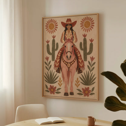 Naive art canvas wall art showing folk art cowgirl on a pink horse framed by cacti and flowers