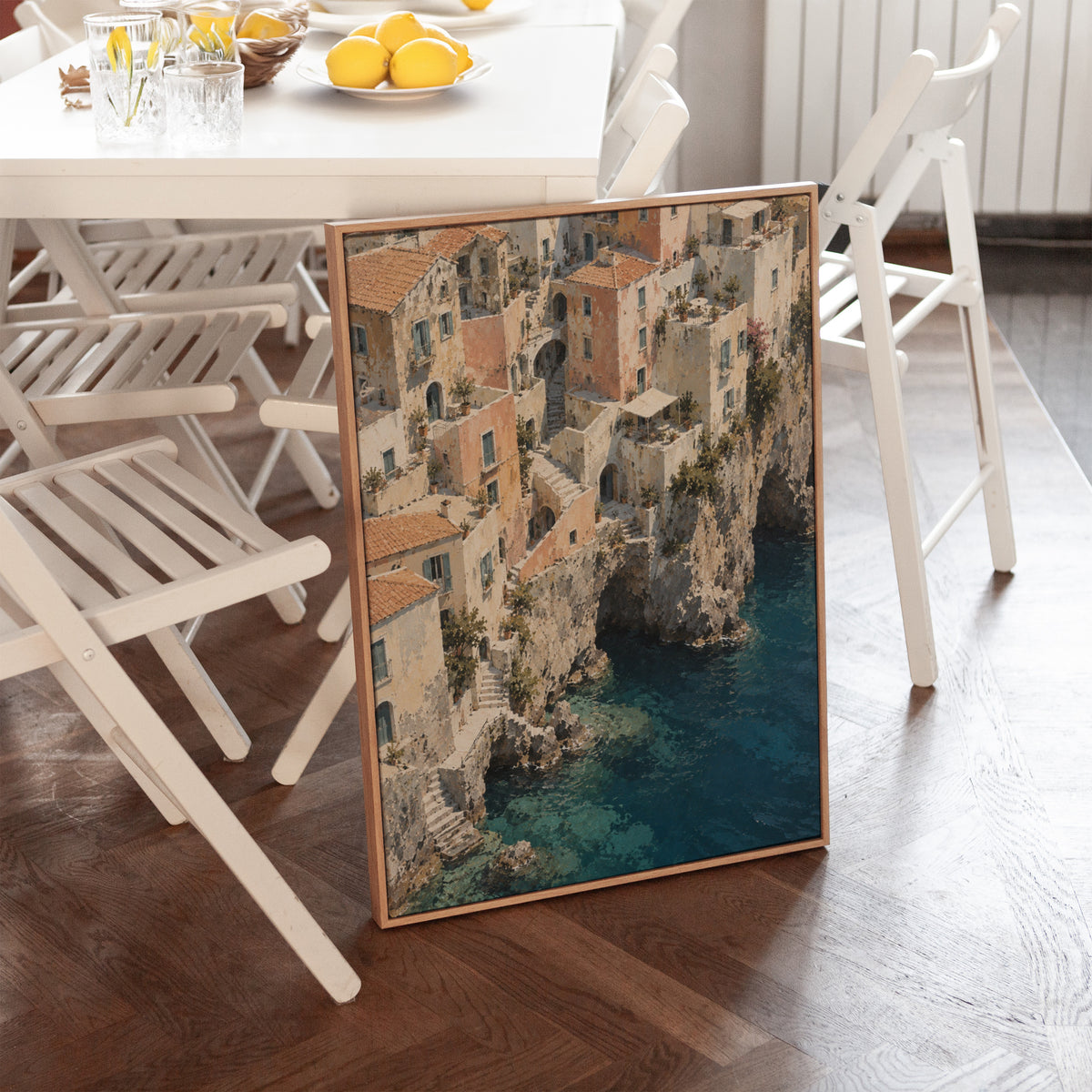 Travel canvas wall art showing cliffside Mediterranean village seen from above with turquoise sea below