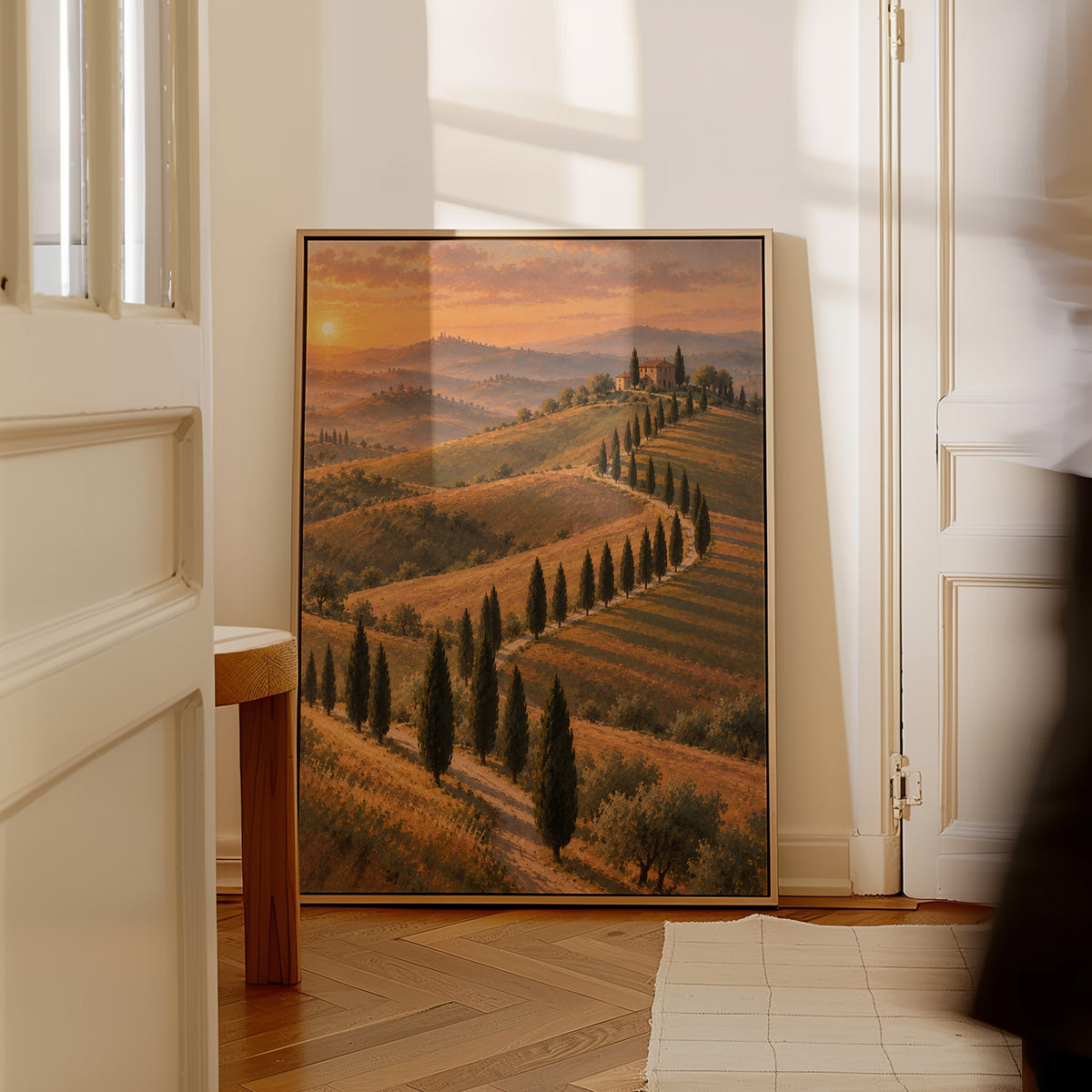 Travel canvas wall art showing cypress-lined road curving up to a Tuscan farmhouse at sunset