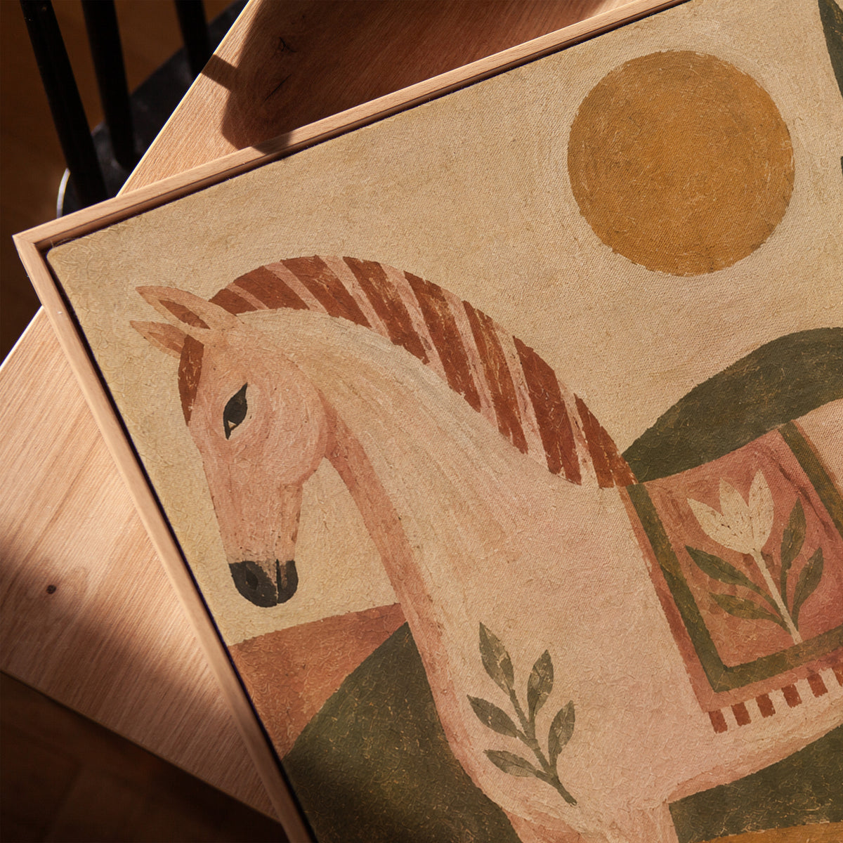 Naive folk pink horse in profile with a patterned saddle blanket, vertical canvas print