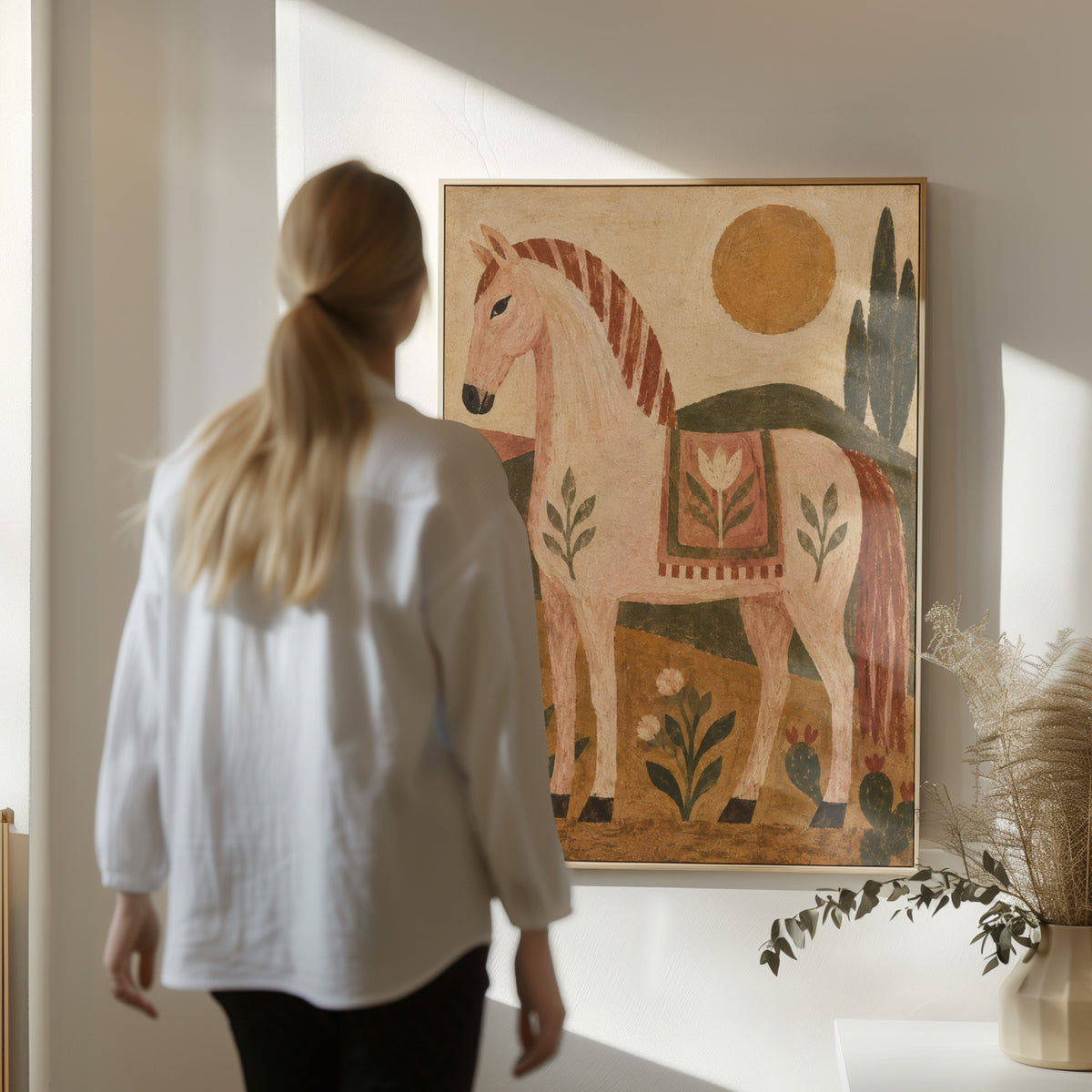 Naive art canvas wall art showing naive folk pink horse in profile with a patterned saddle blanket