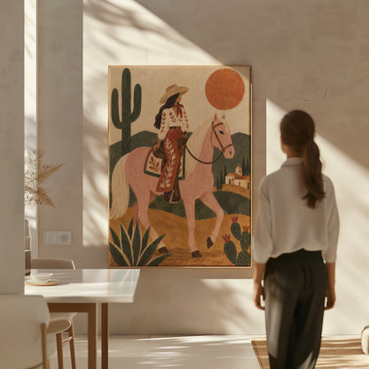 Cowgirl riding a pale rose horse past cacti under a red desert sun, canvas print