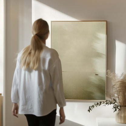 Misty sea canvas wall art showing a single small boat on flat pale water with a distant headland in mist
