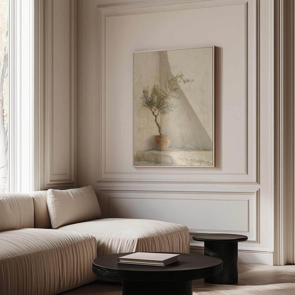Neutral canvas wall art showing small olive tree in a terracotta pot in a sunlit courtyard corner