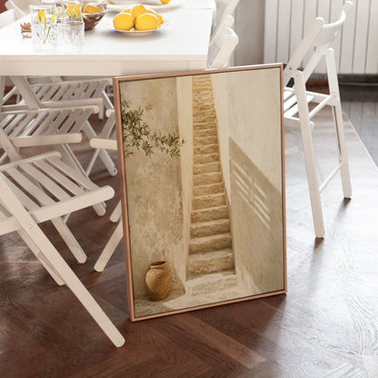 Narrow stone stairway between sunlit walls with a terracotta urn below, canvas art print