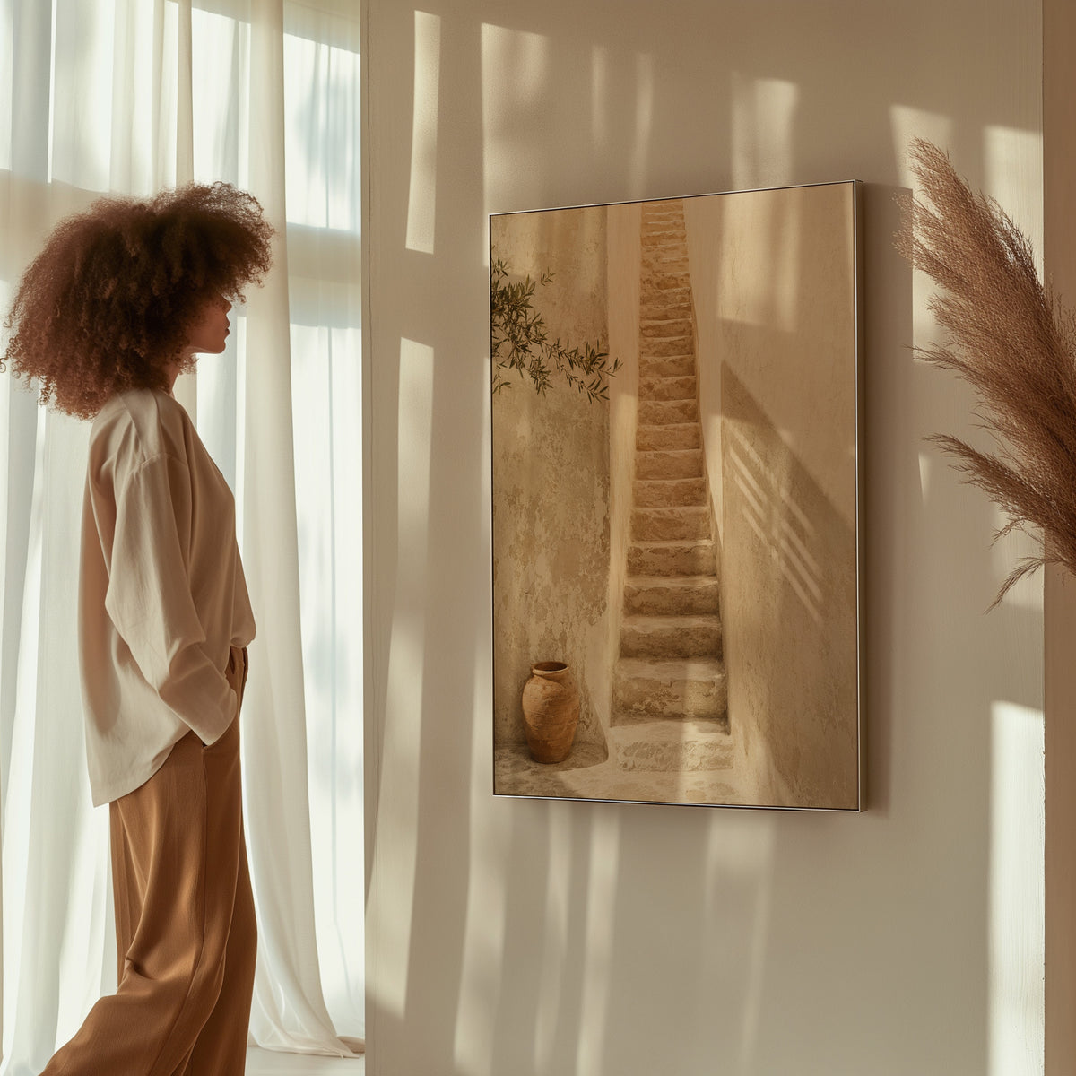 Beige canvas wall art showing narrow stone stairway between sunlit walls with a terracotta urn below