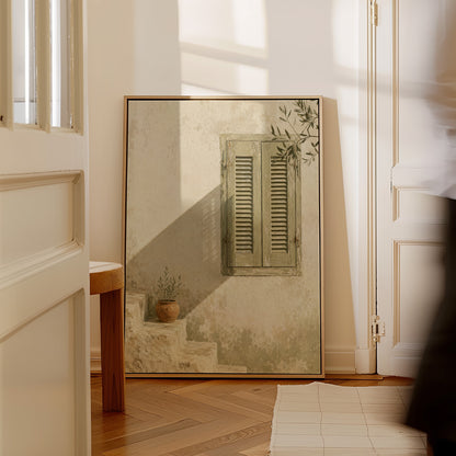 Sage green louvred shutters on a bone wall with an olive branch above, canvas art print
