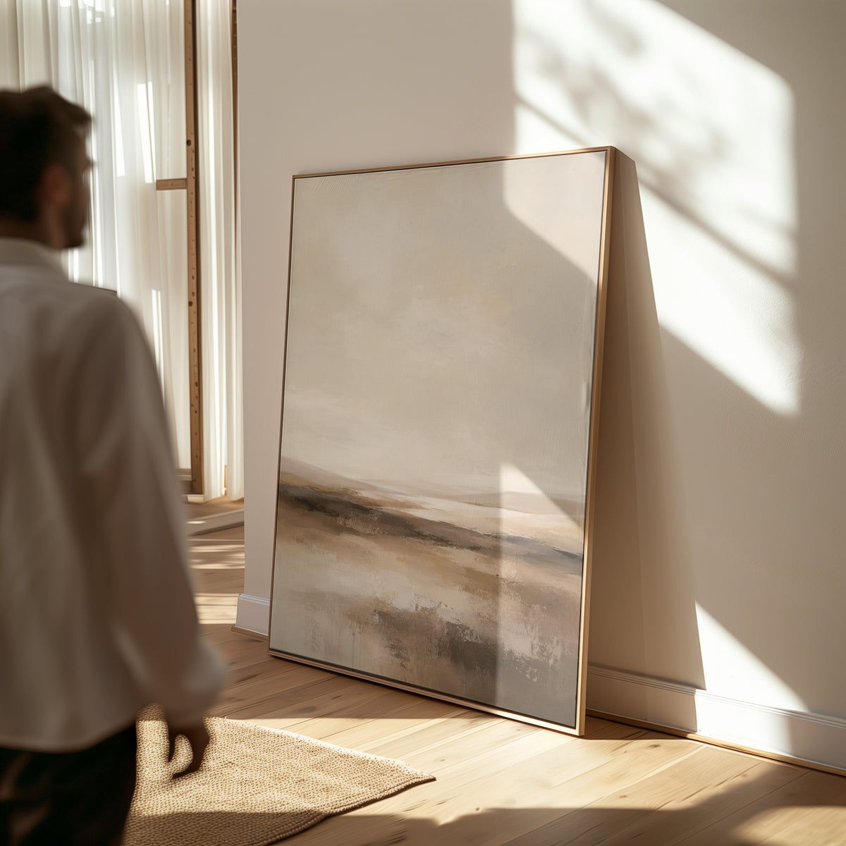 Brown canvas wall art showing abstract neutral landscape with a pale sky and layered bands of brown and cream