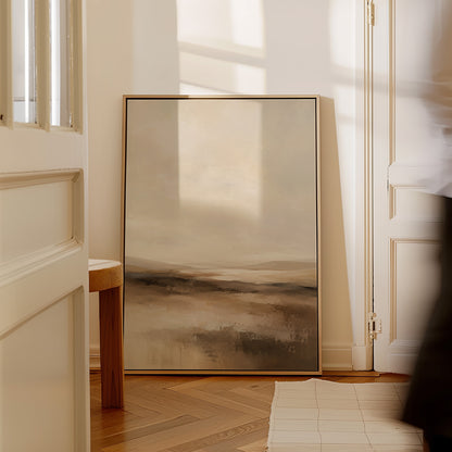 Modern canvas wall art showing abstract neutral landscape with a pale sky and layered bands of brown and cream