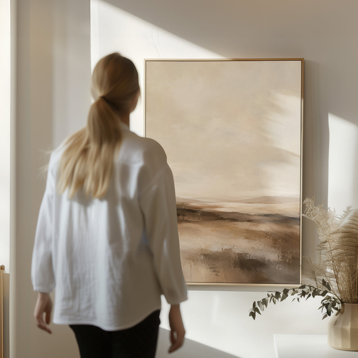 Abstract landscape canvas wall art showing abstract neutral landscape with a pale sky and layered bands of brown and cream