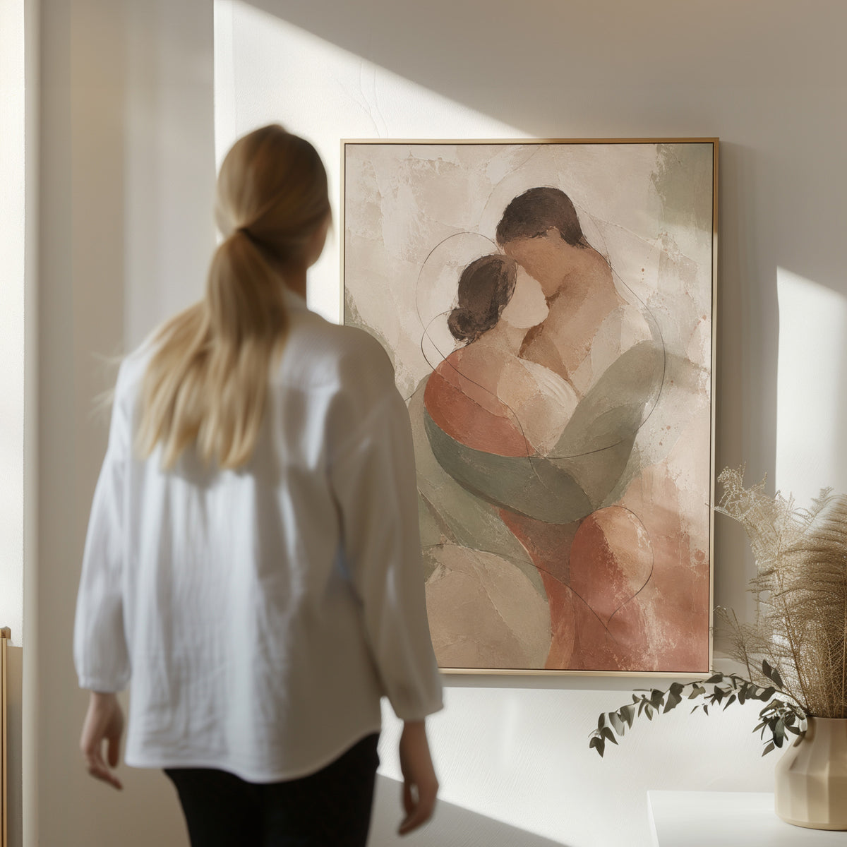 Abstract embracing couple in sage green and rust on a pale ground, canvas art print