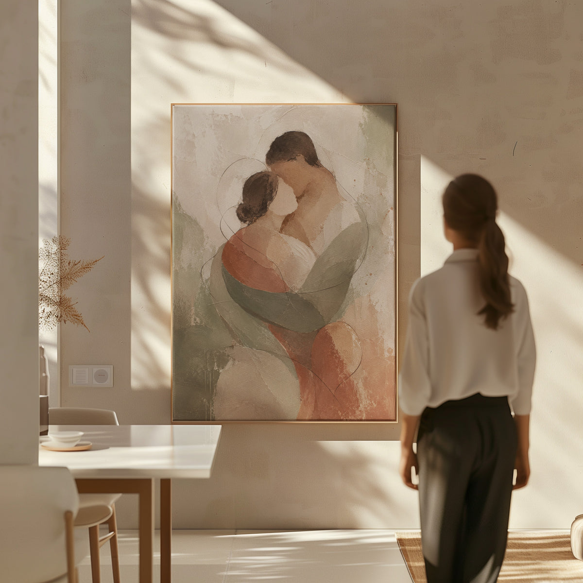 Terracotta canvas wall art showing abstract embracing couple in sage green and rust on a pale ground