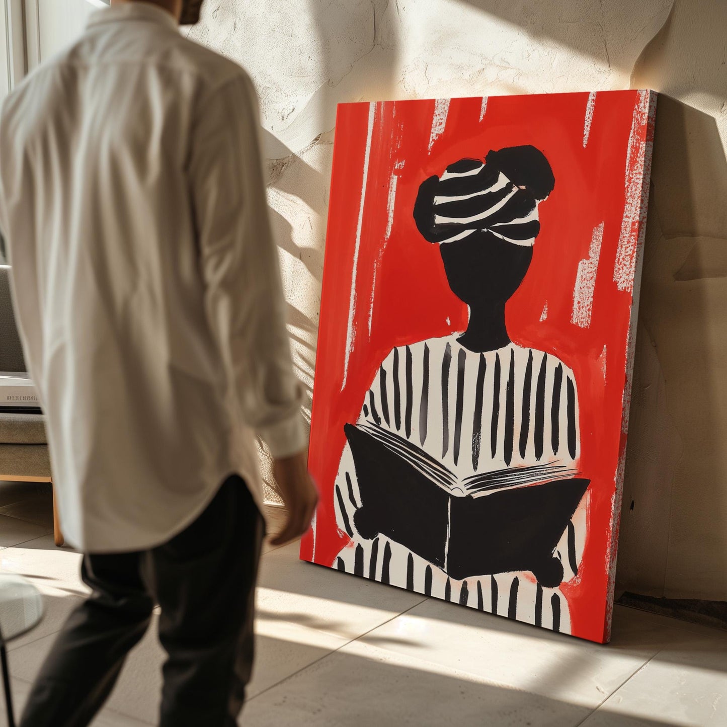 Figurative Canvas Wall Art Woman Reading in Black and White Striped Outfit on Red Background Frame