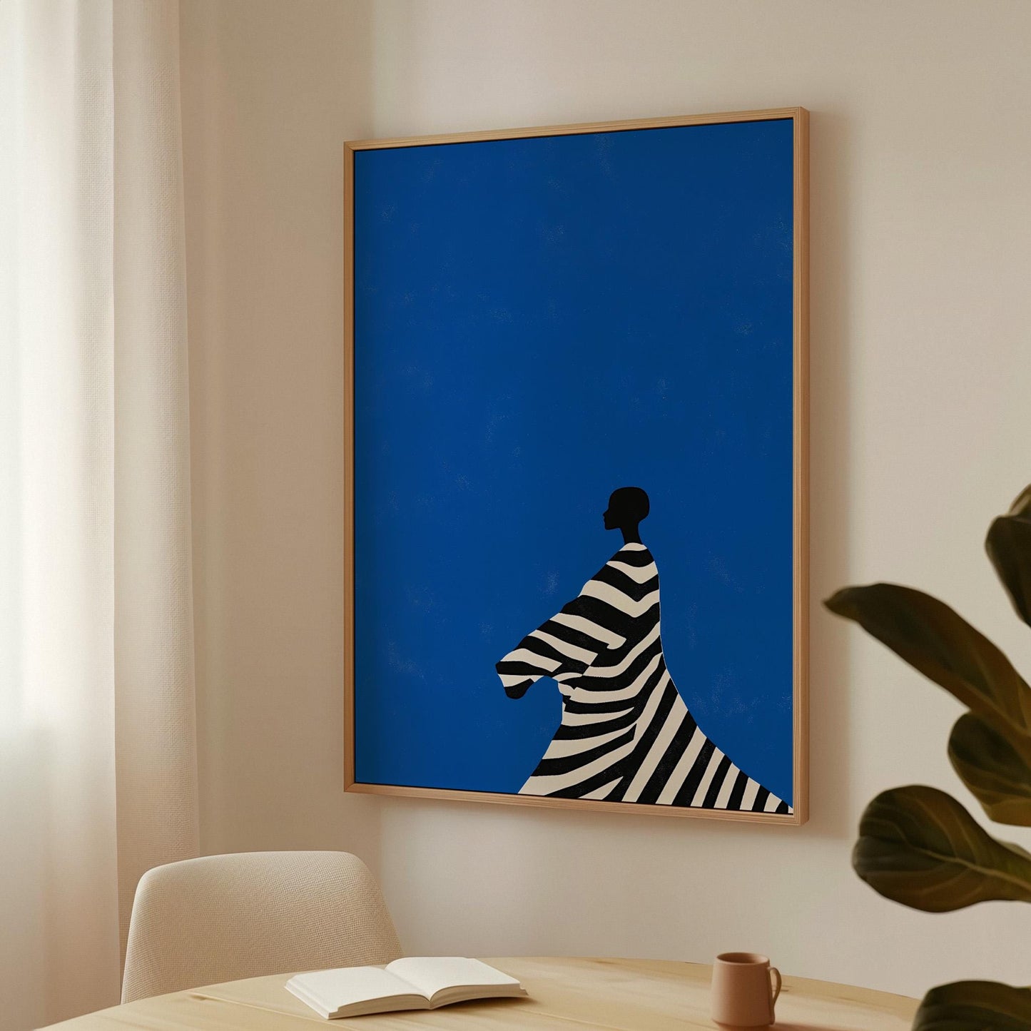 Figurative Canvas Wall Art Woman in Black and White Striped Dress on Bold Blue Background Framed Print